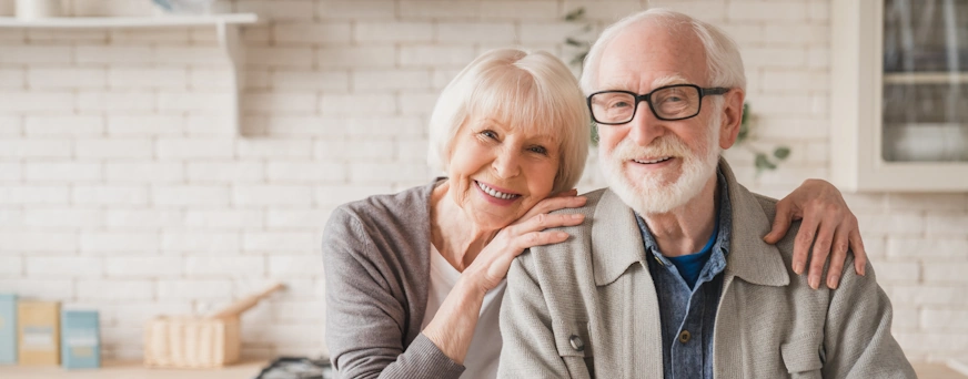 Life Assure Senior Wife Husband Posing In Kitchen Blog